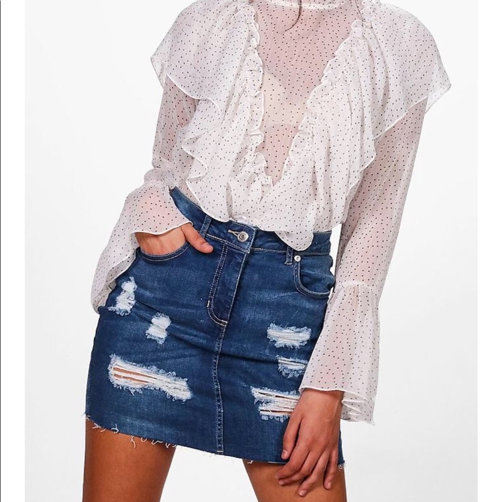 Distressed denim mini skirt